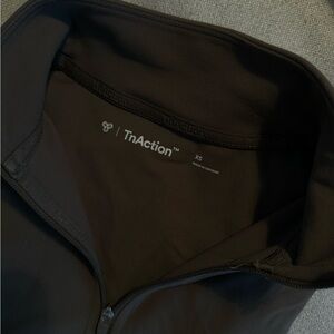 TnAction | Tnabutter ‘Limit Hip Zip-Up’